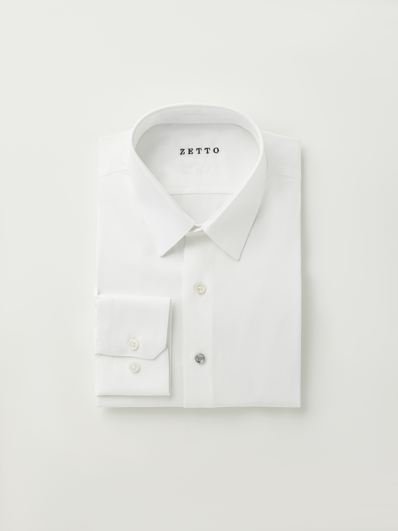 Chemise homme blanche avec bouton doré